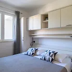 穆勒公寓 * 米利尼